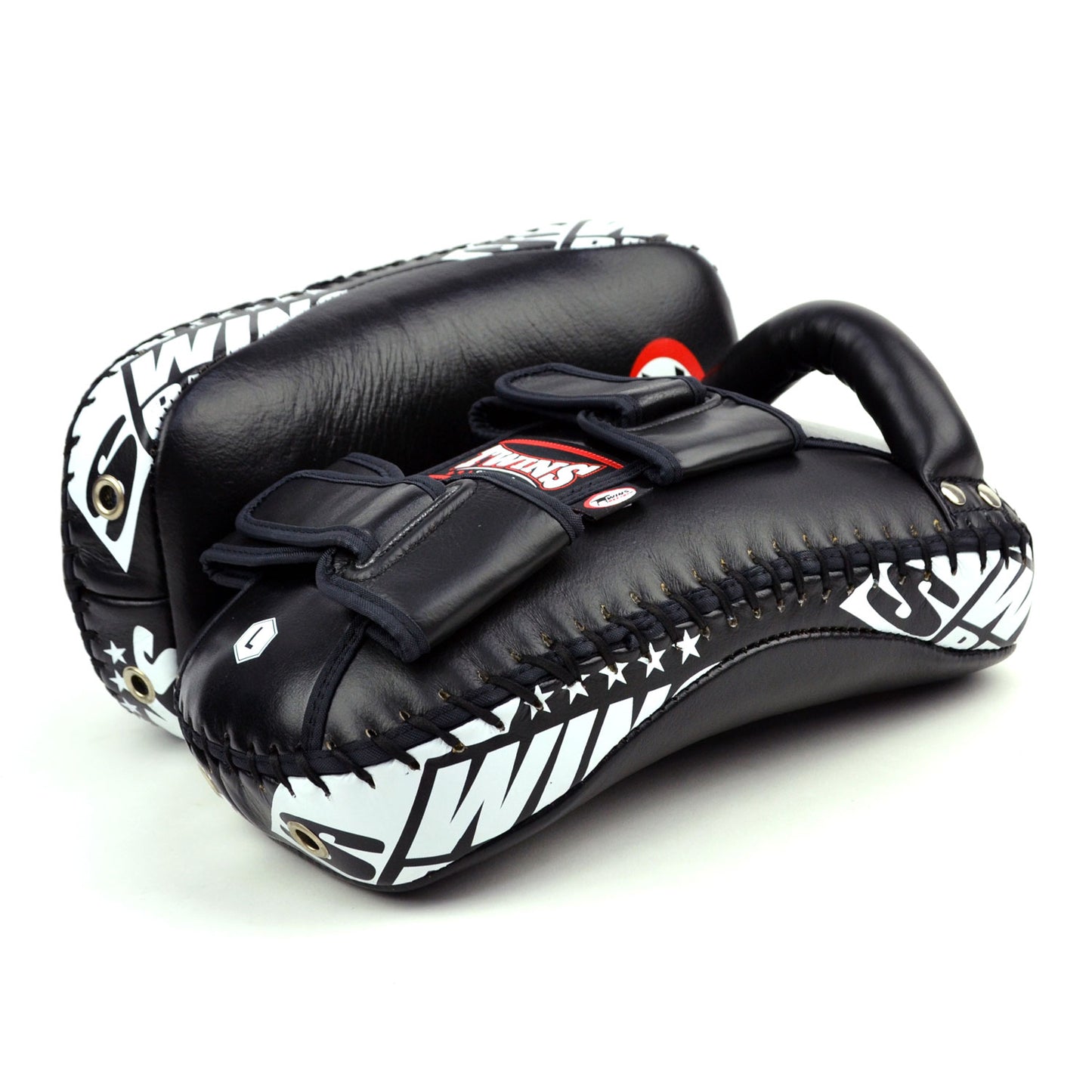 Black kick pads with Twins Special logo on a white background