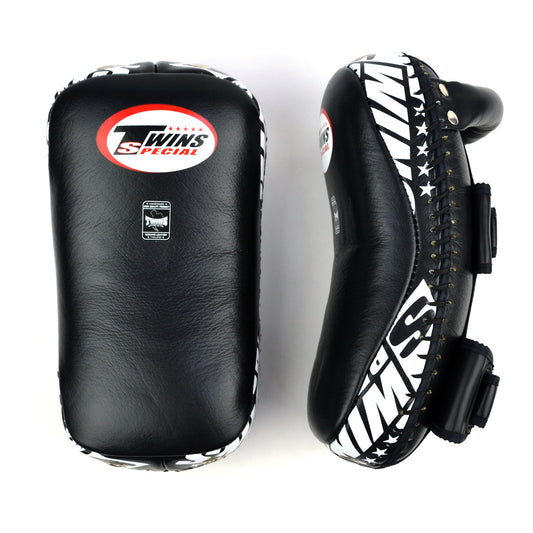 Black kick pads with Twins Special logo on a white background