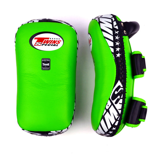 Green kick pads with Twins Special logo on a white background