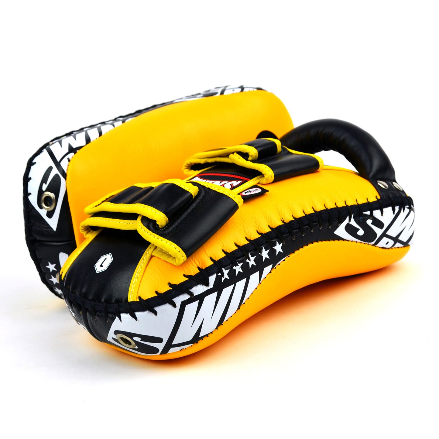 Yellow kick pads with Twins Special logo on a white background