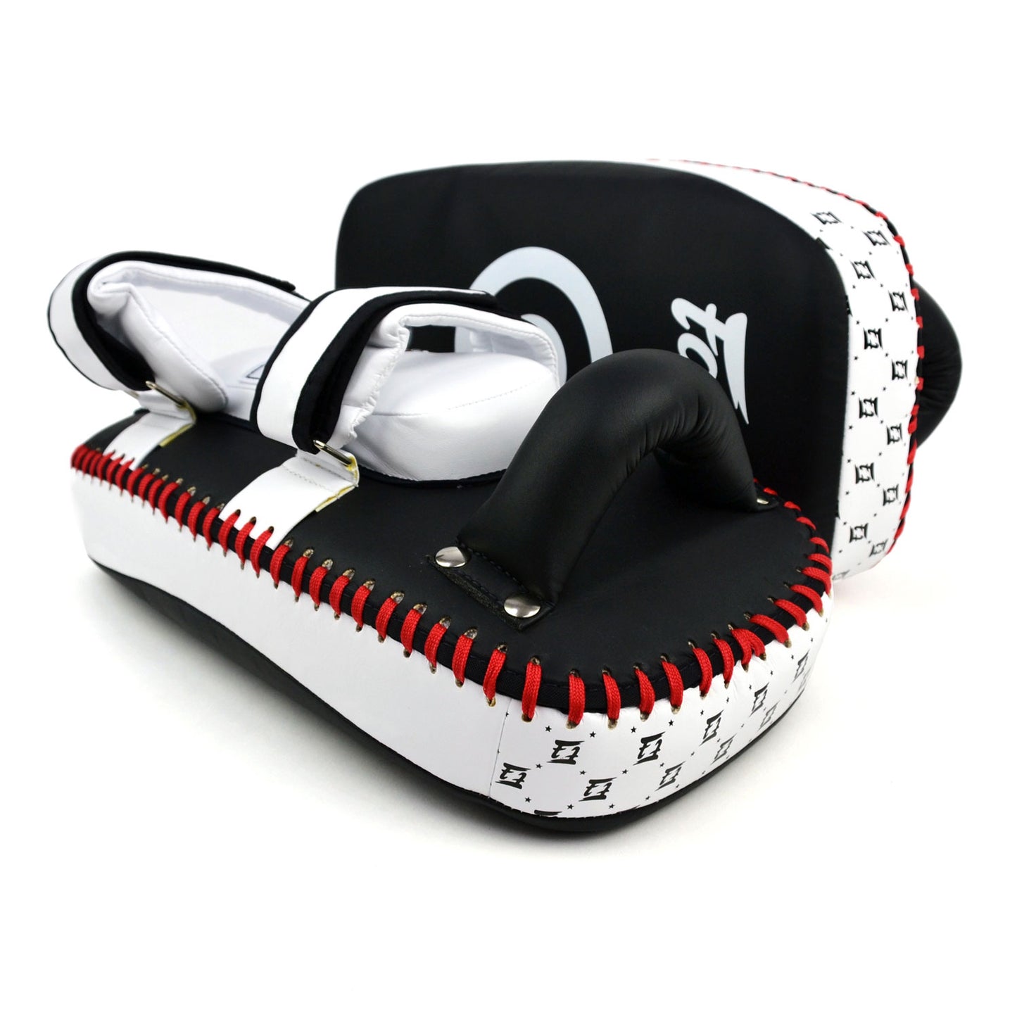 Black and white Fairtex boxing pads with a target design on a white background