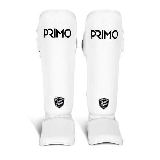 White shin guards with 'Primo' branding on a white background