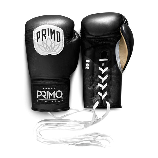 Black boxing gloves with white laces and 'Primo Fightwear' branding on a white background