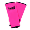 Pink ankle guards with 'Twins Special' logo on a white background