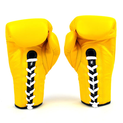 Pair of yellow boxing gloves with black and white laces on a white background