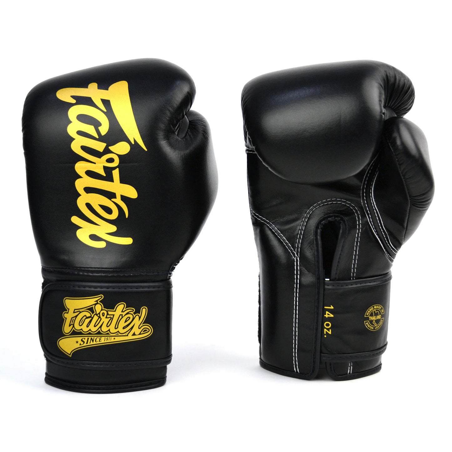 Black boxing gloves with gold 'Fairtex' branding on a white background