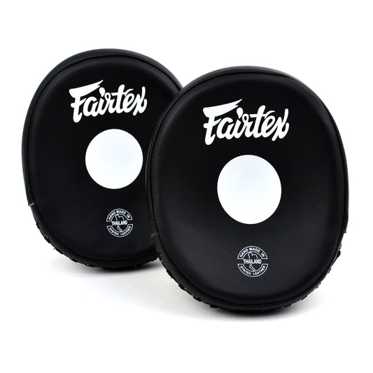 Two black Fairtex punching pads on a white background