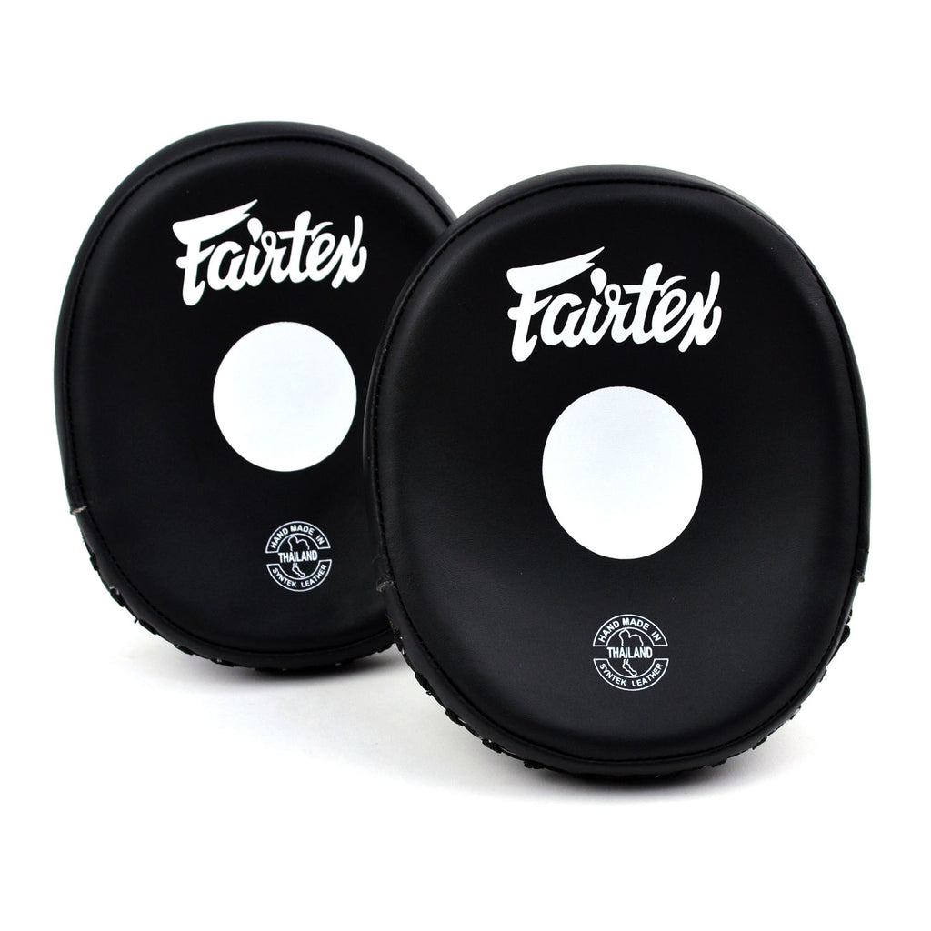 Two black Fairtex punching pads on a white background