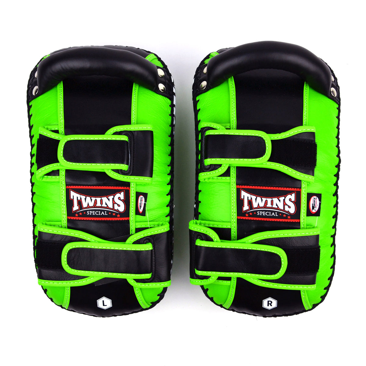 Green kick pads with Twins Special logo on a white background