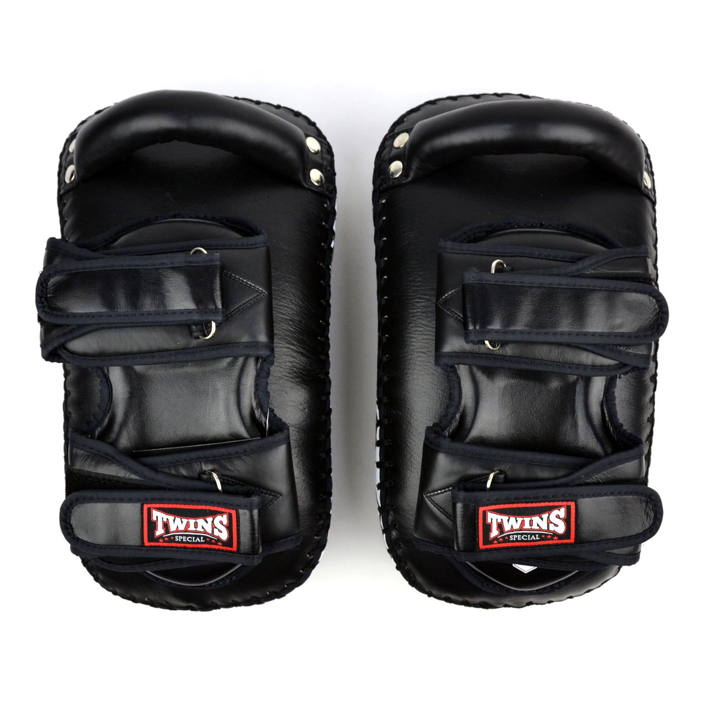 Pair of black Twins Special kick pads on a white background