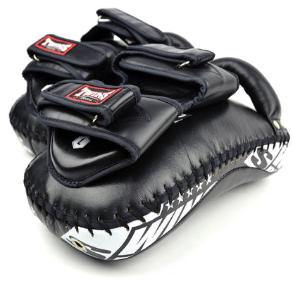 Pair of black and white kick pads with brand logo on a white background