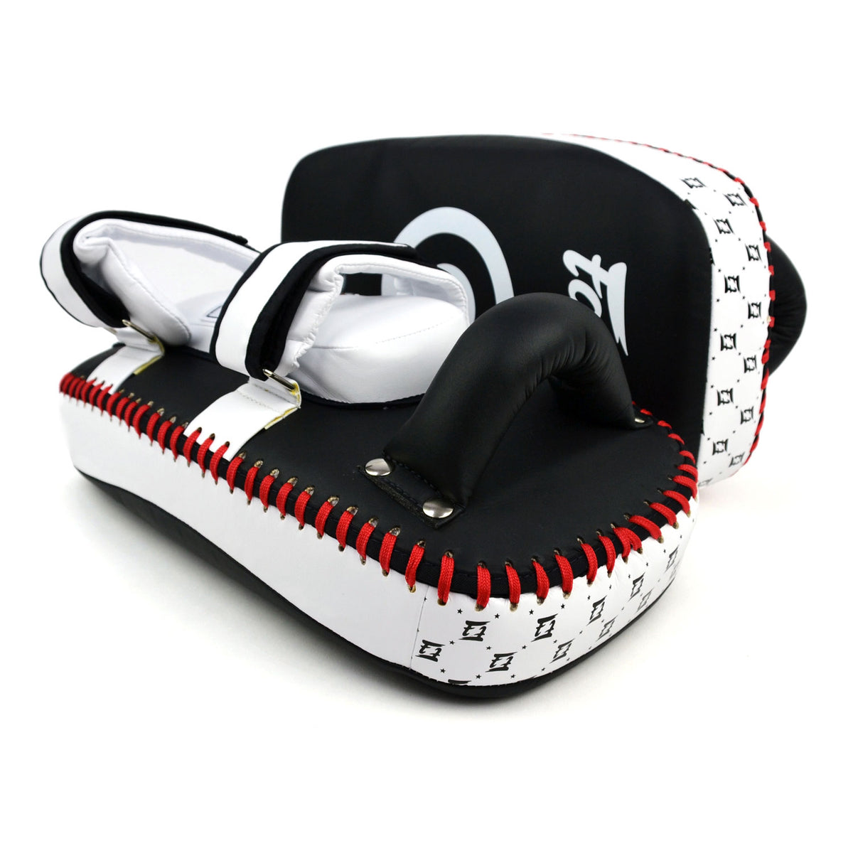Black and white Fairtex boxing pads with a target design on a white background