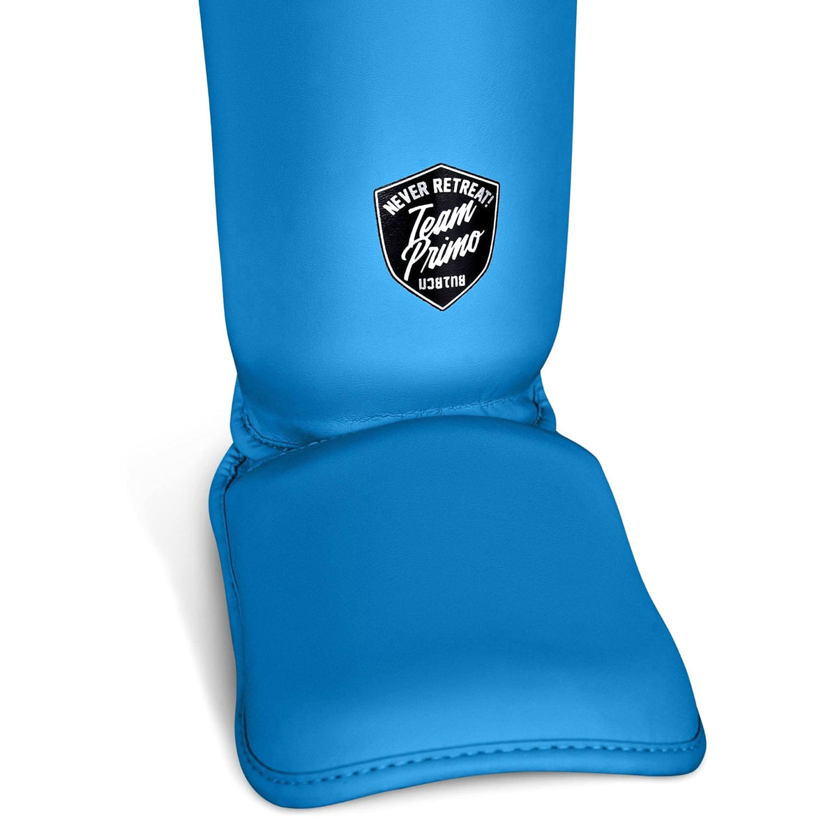 Blue shin guard with a logo on a white background