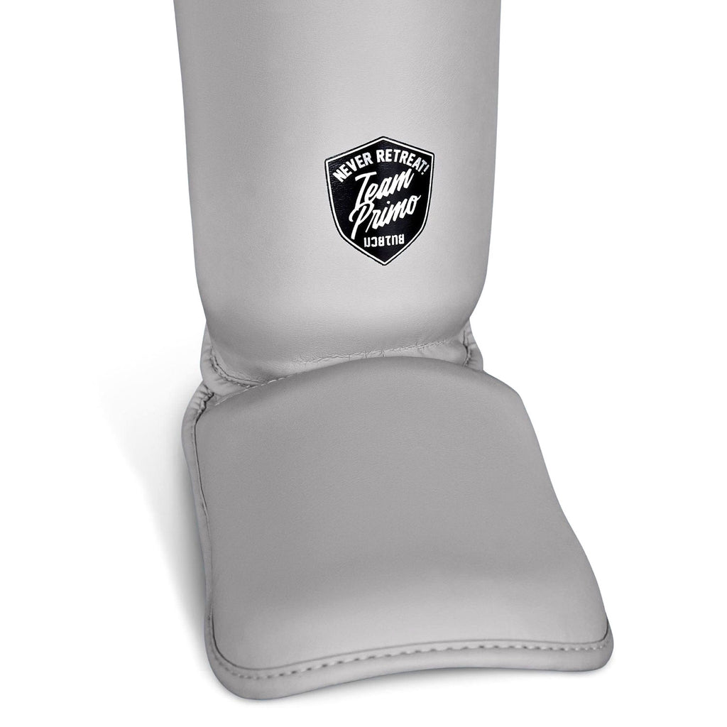 Gray protective gear with a logo on a white background