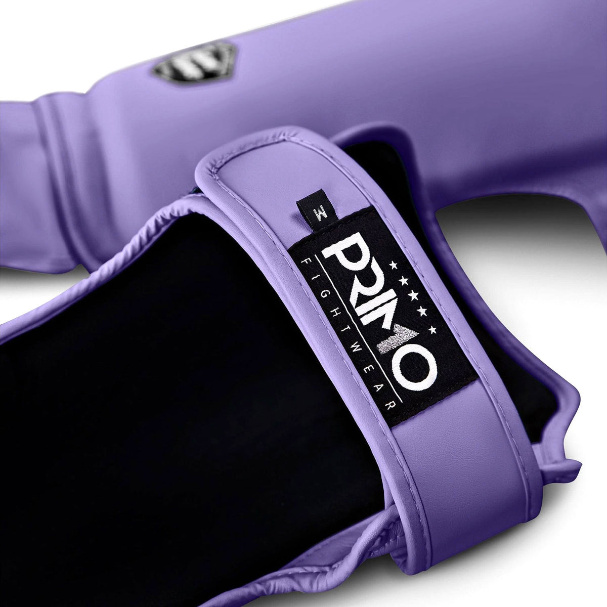 Purple boxing glove with a Primo Fightwear label on a white background