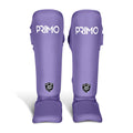 Purple Primo shin guards on a white background