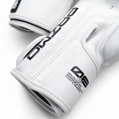 White gloves with black branding on a light gray background