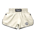 Beige boxing shorts with 'Primo' branding on a light gray background