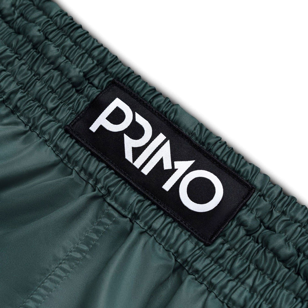 Green fabric with a 'Primo' logo patch on a white background