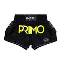 Black boxing shorts with yellow 'Primo' branding on a white background