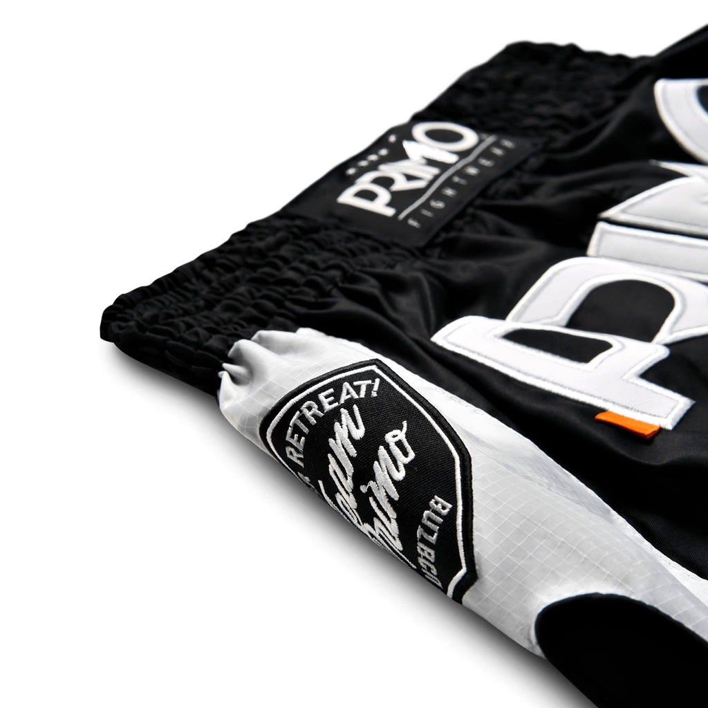 Black and white boxing shorts with 'Promo' branding on a white background