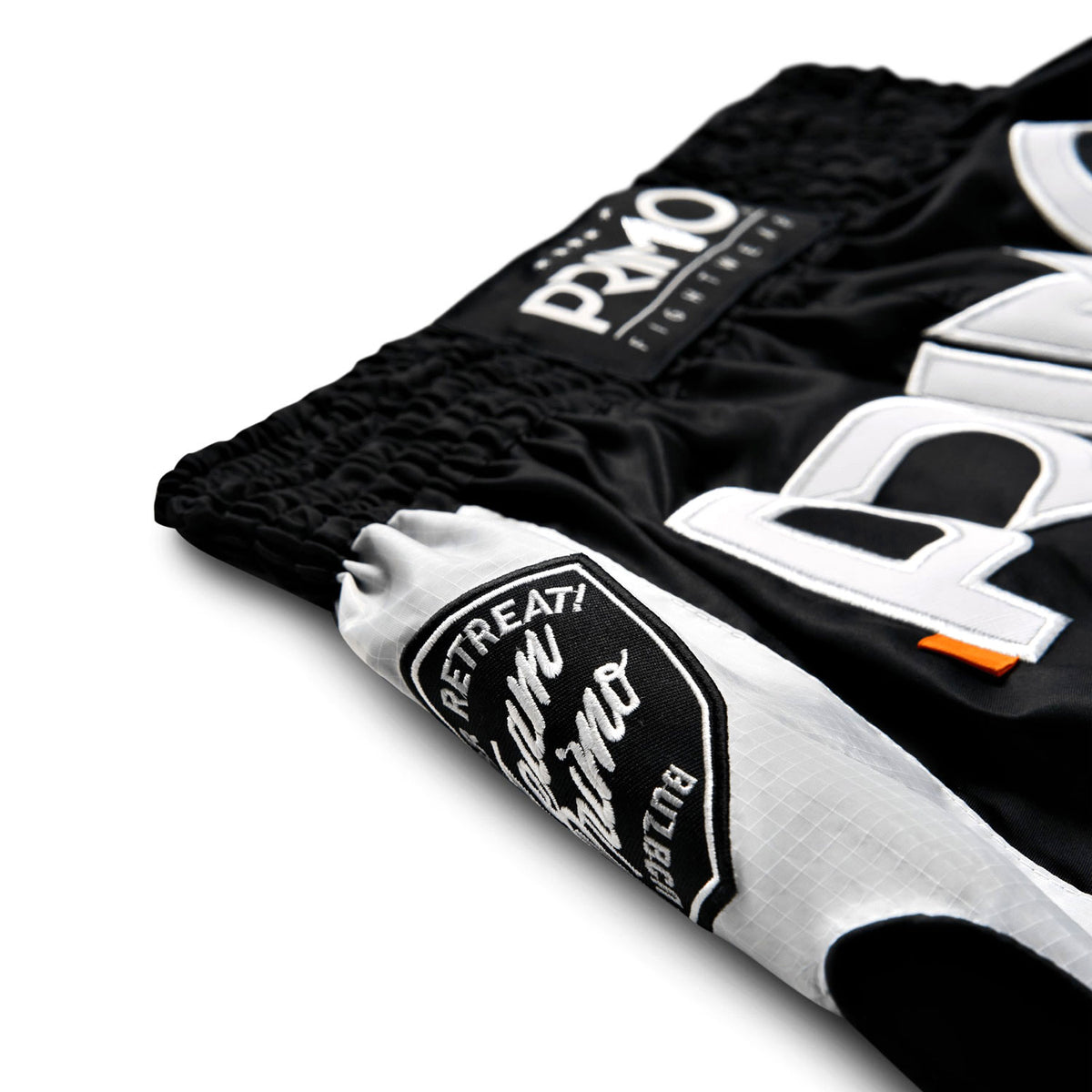 Black and white boxing shorts with 'Promo' branding on a white background