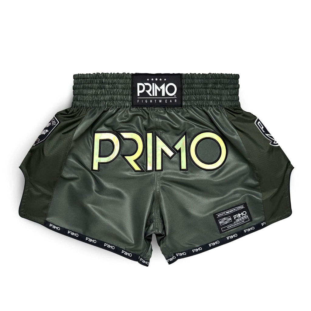 Green boxing shorts with 'Primo' branding on a white background