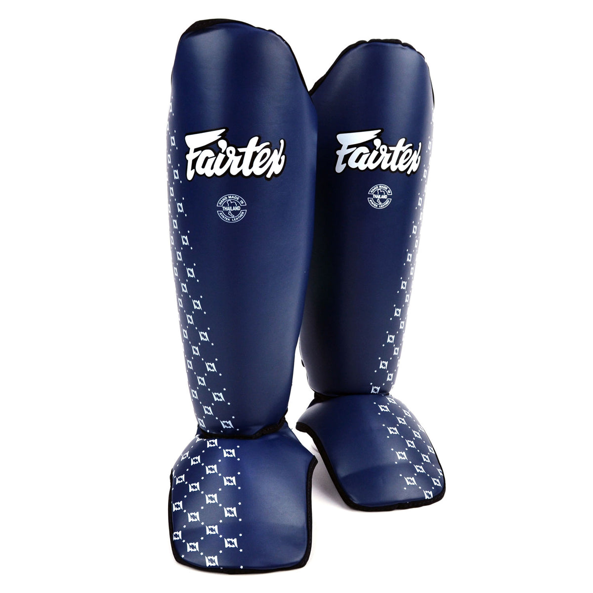 Pair of blue Fairtex shin guards with white patterns on a white background