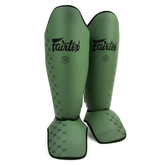 Olive Fairtex shin guards on a white background