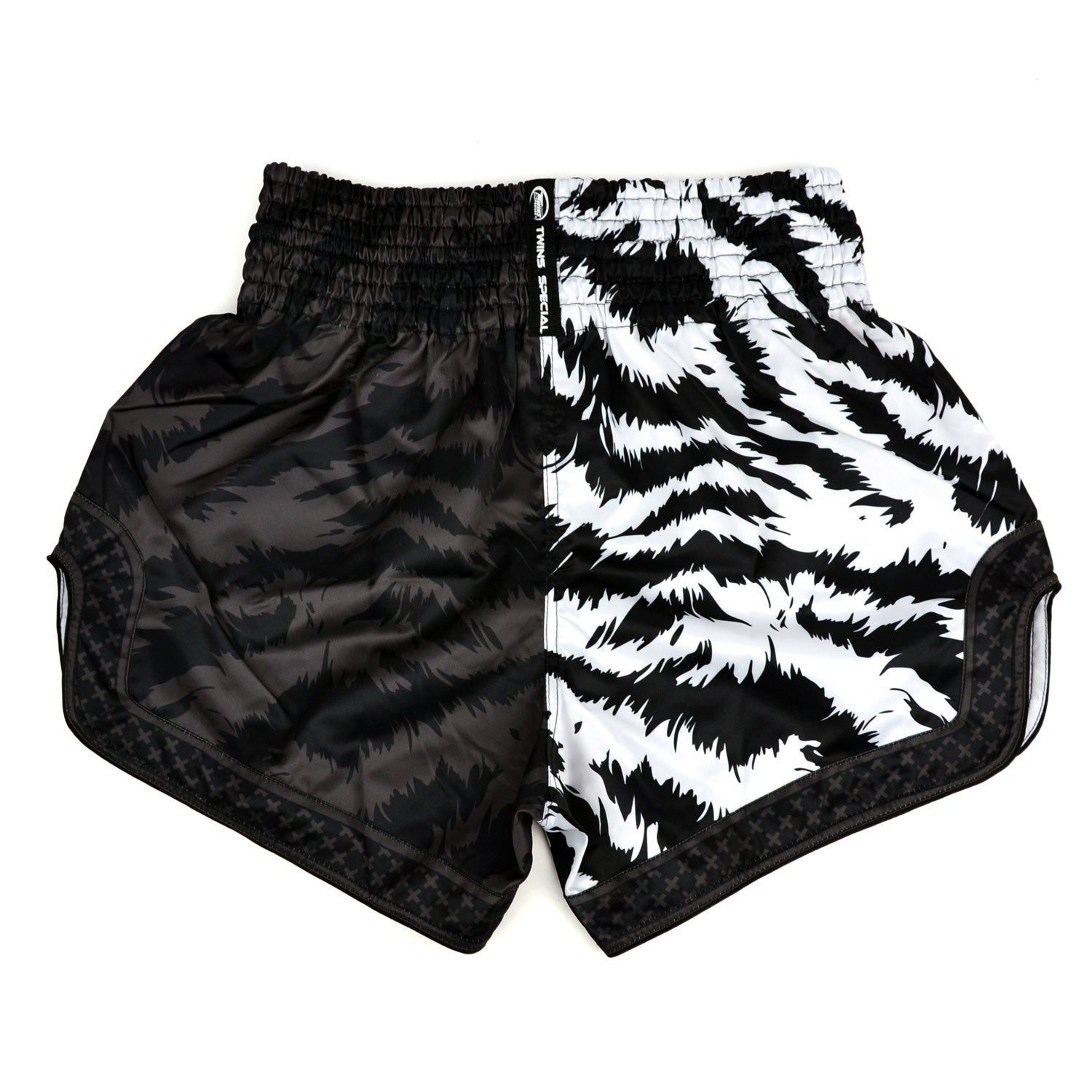 Black and white patterned shorts with 'Twins Special' branding on a white background