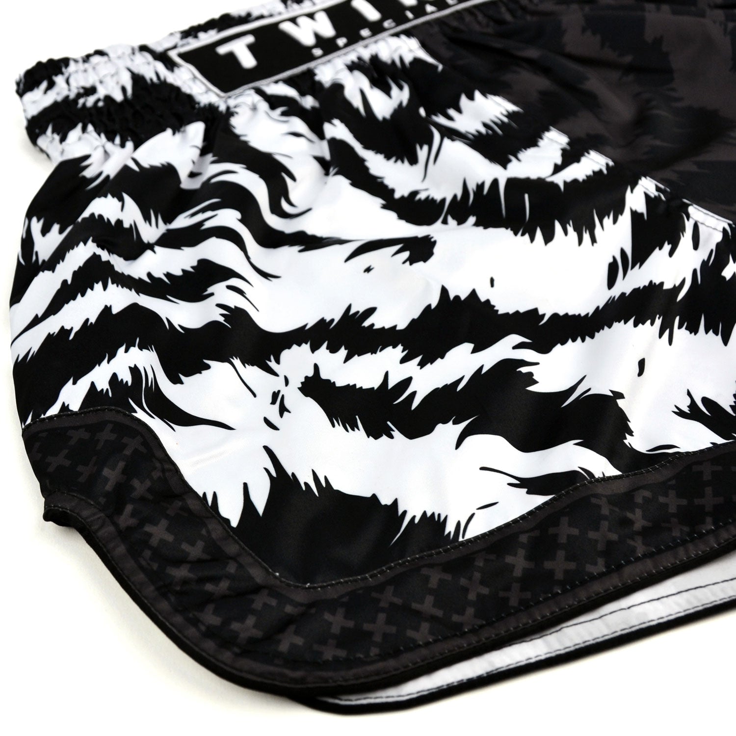 Black and white patterned shorts with 'Twins Special' branding on a white background