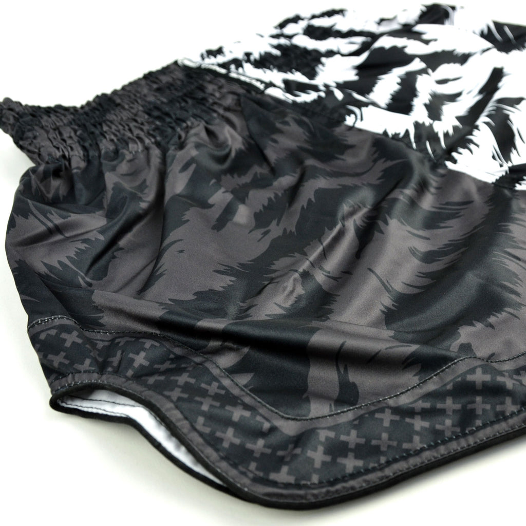 Black and white patterned shorts with 'Twins Special' branding on a white background