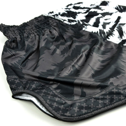 Black and white patterned shorts with 'Twins Special' branding on a white background