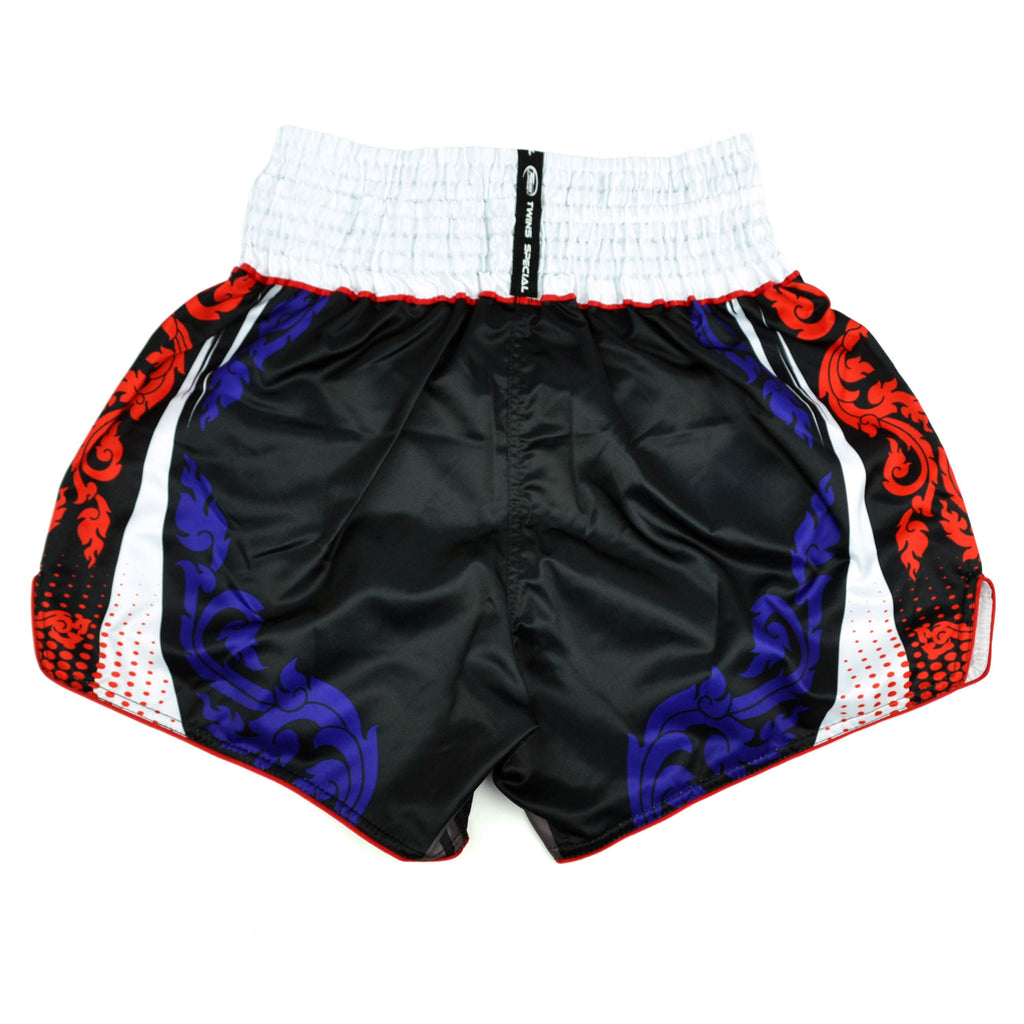 Black boxing shorts with red and blue designs and Twins Special logo on a white background