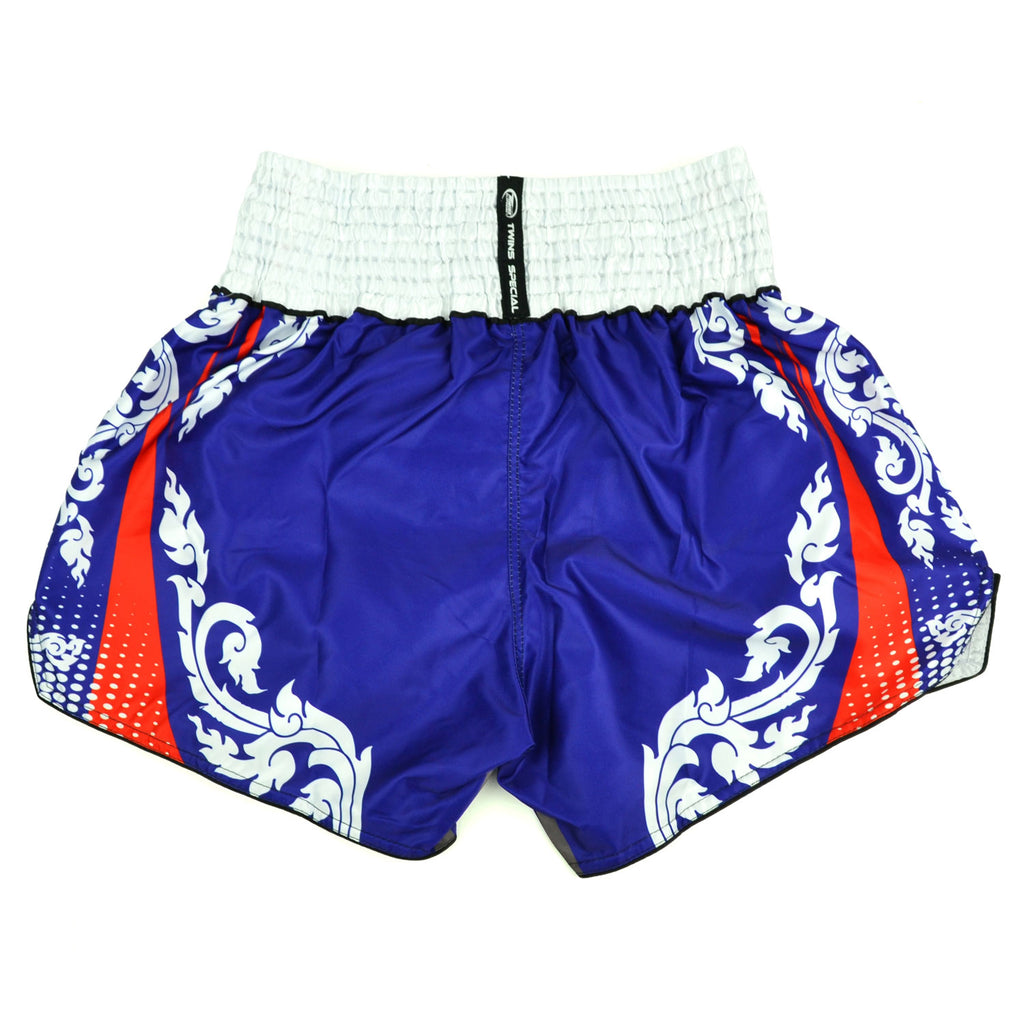 Blue and white Muay Thai shorts with red accents and Twins Special logo on a white background