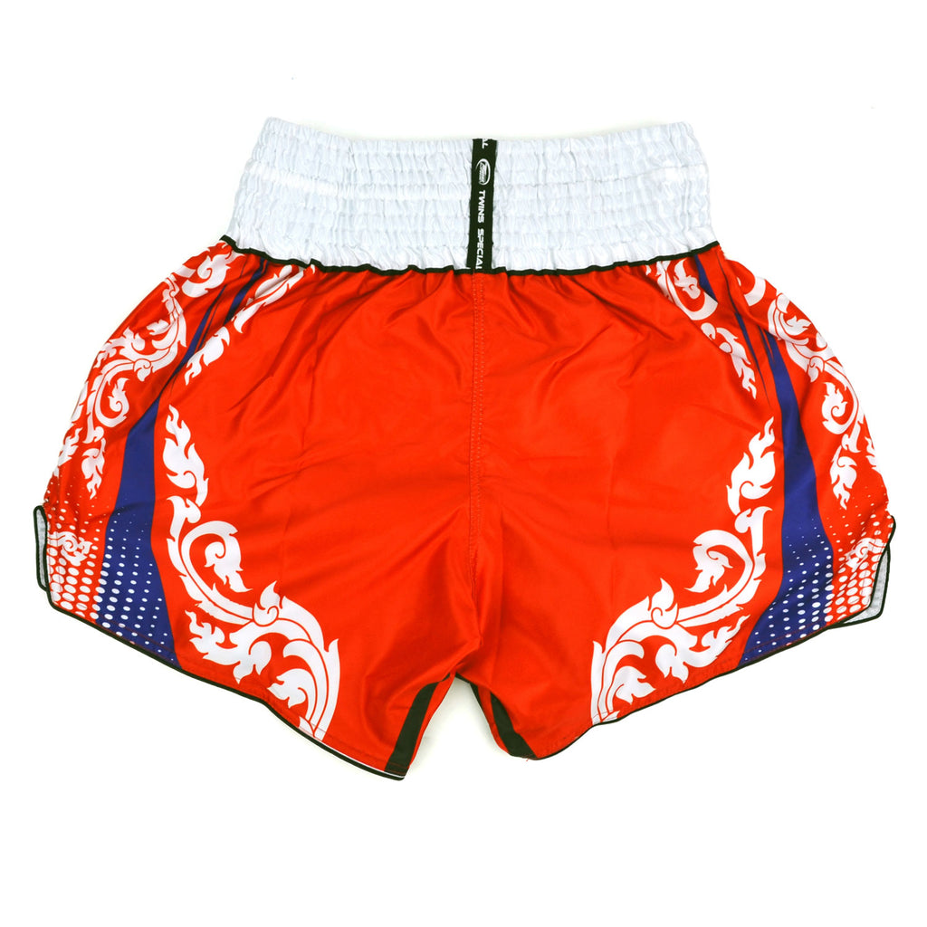 Red boxing shorts with white and blue patterns and 'Twins' branding on a white background