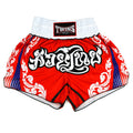 Red boxing shorts with white and blue patterns and 'Twins' branding on a white background