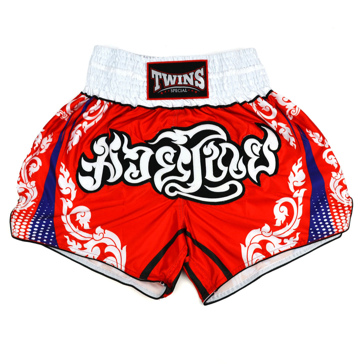 Red boxing shorts with white and blue patterns and 'Twins' branding on a white background