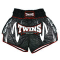 Black Twins Special boxing shorts with white and red text on a white background