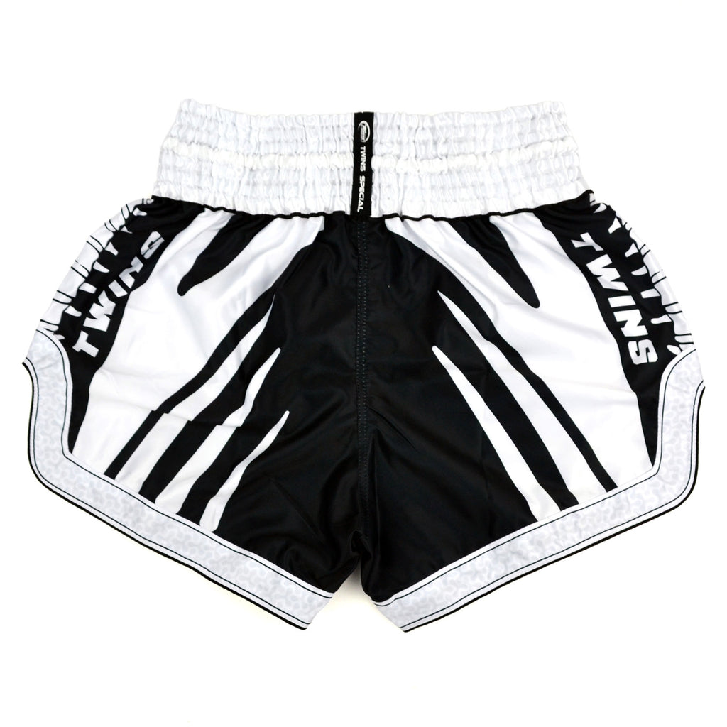 Black and white boxing shorts with 'Twins Special' branding on a white background