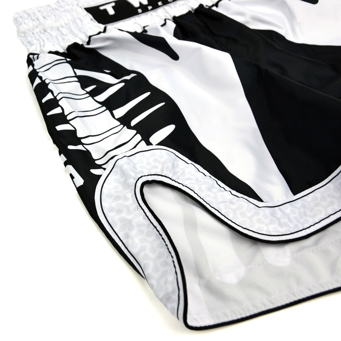 Black and white boxing shorts with 'Twins Special' branding on a white background
