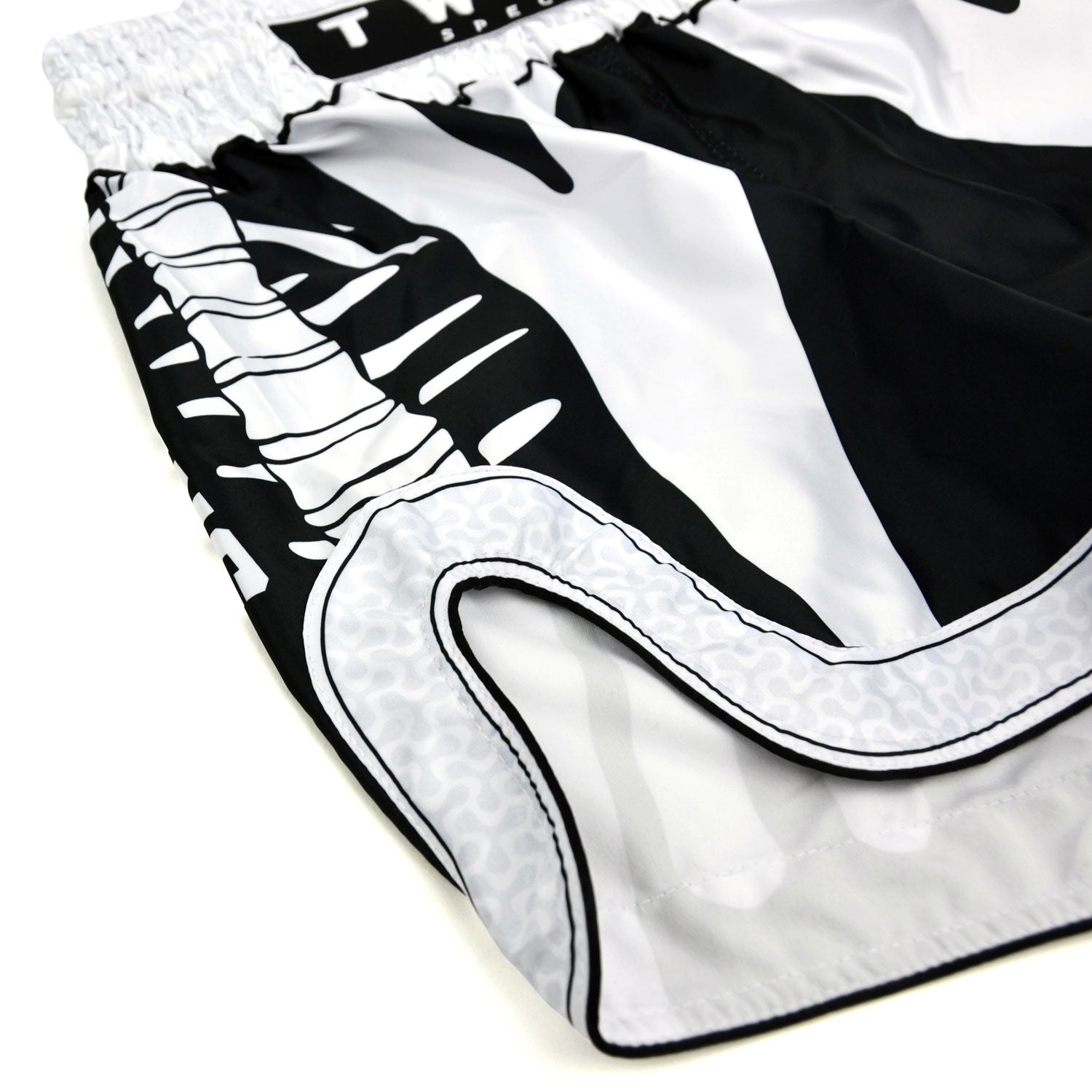 Black and white boxing shorts with 'Twins Special' branding on a white background