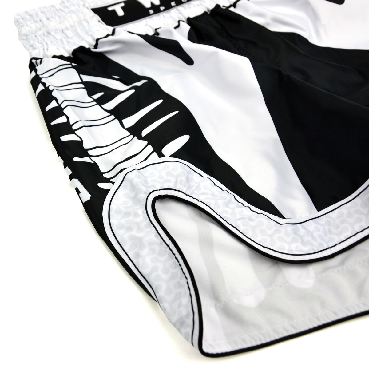 Black and white boxing shorts with 'Twins Special' branding on a white background