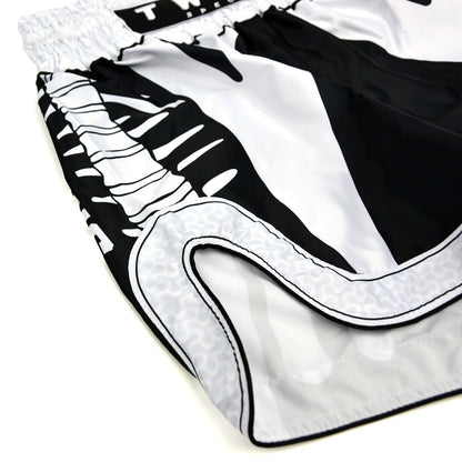 Black and white boxing shorts with 'Twins Special' branding on a white background