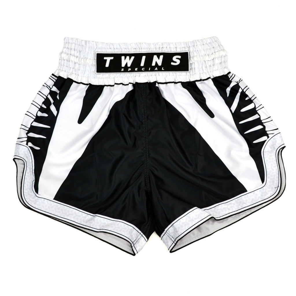 Black and white boxing shorts with 'Twins Special' branding on a white background