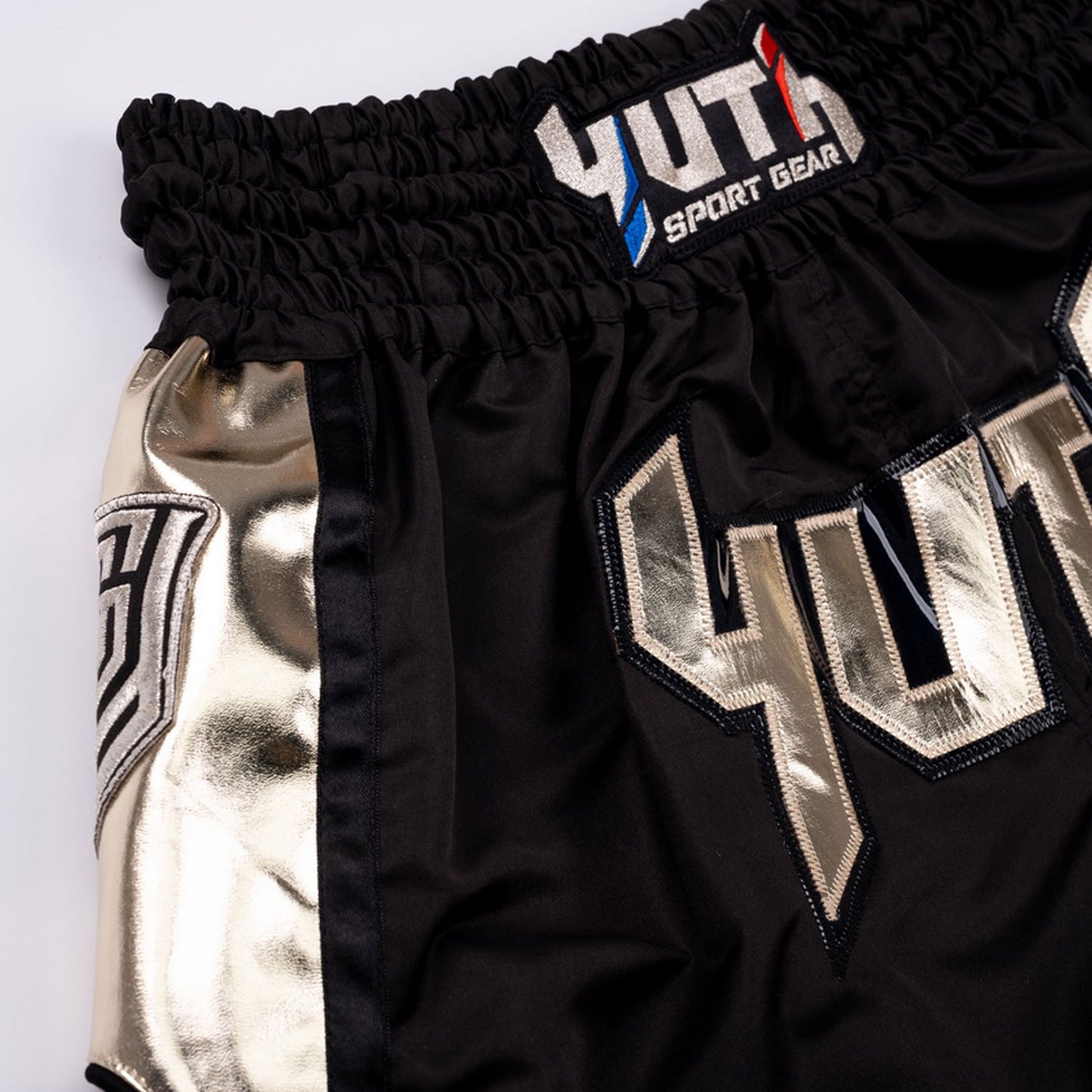 yhmts-001-yuth-hologram-muaythai-shorts-black-gold-2