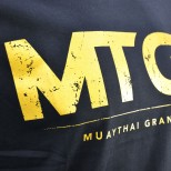 TS Fairtex X MTGP Black-Gold Official T-Shirt